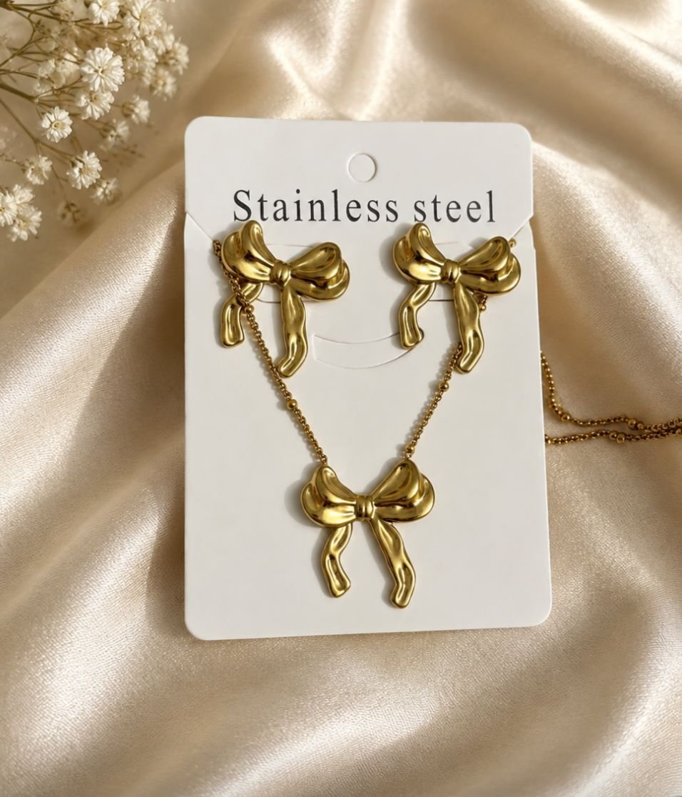 WhatsApp Image 2026-08-31 at 10.48.12 AM Golden Bow Stainless Steel Jewelry Set - Image 1