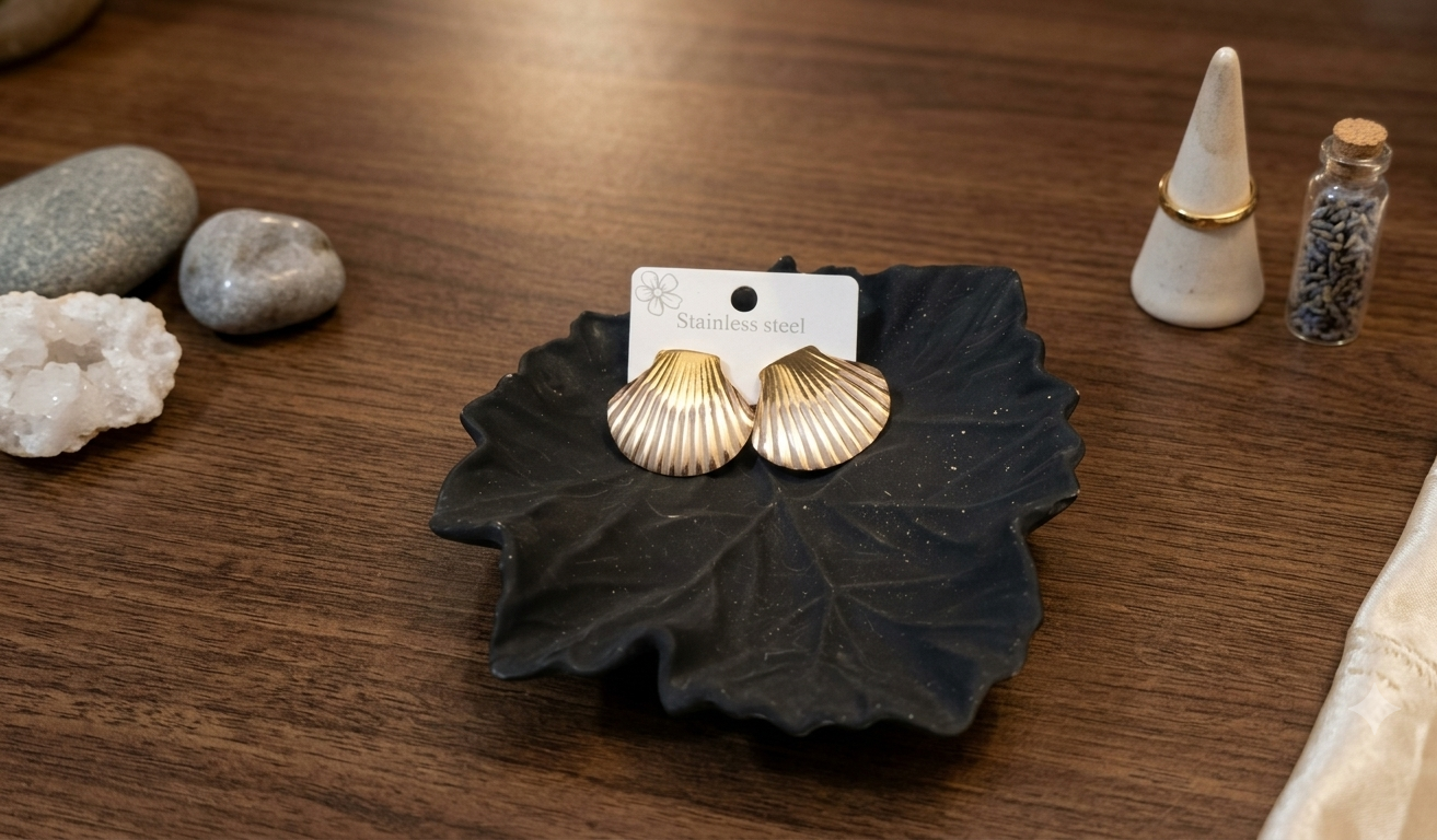 see Gold-tone Shell Stud Earrings - Image 1